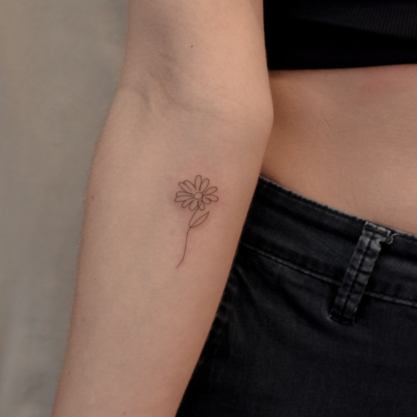 Considering a Fine Line Tattoo? Here's What to Know Before Getting One